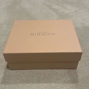 This is a shoe box without any shoes. It’s EMPTY